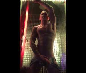 Boy dance Striptease in glass cage